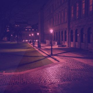 dark and crimson-tinged university quad